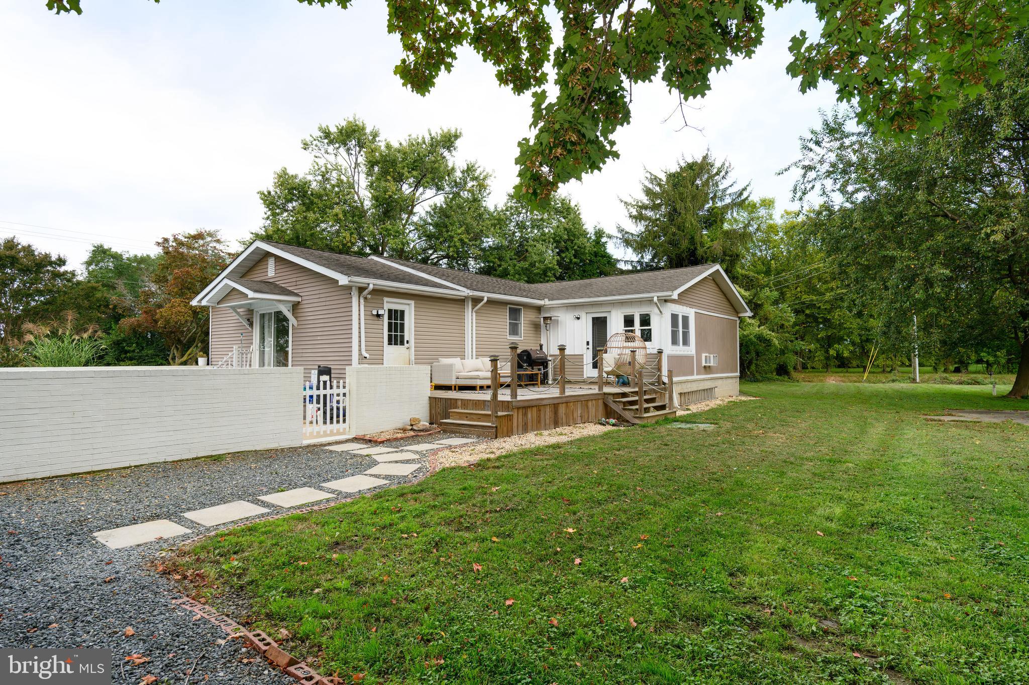 7653 Broad Neck Road Chestertown, MD 21620 - Photo 6 of 39 a front view of house with yard and green space