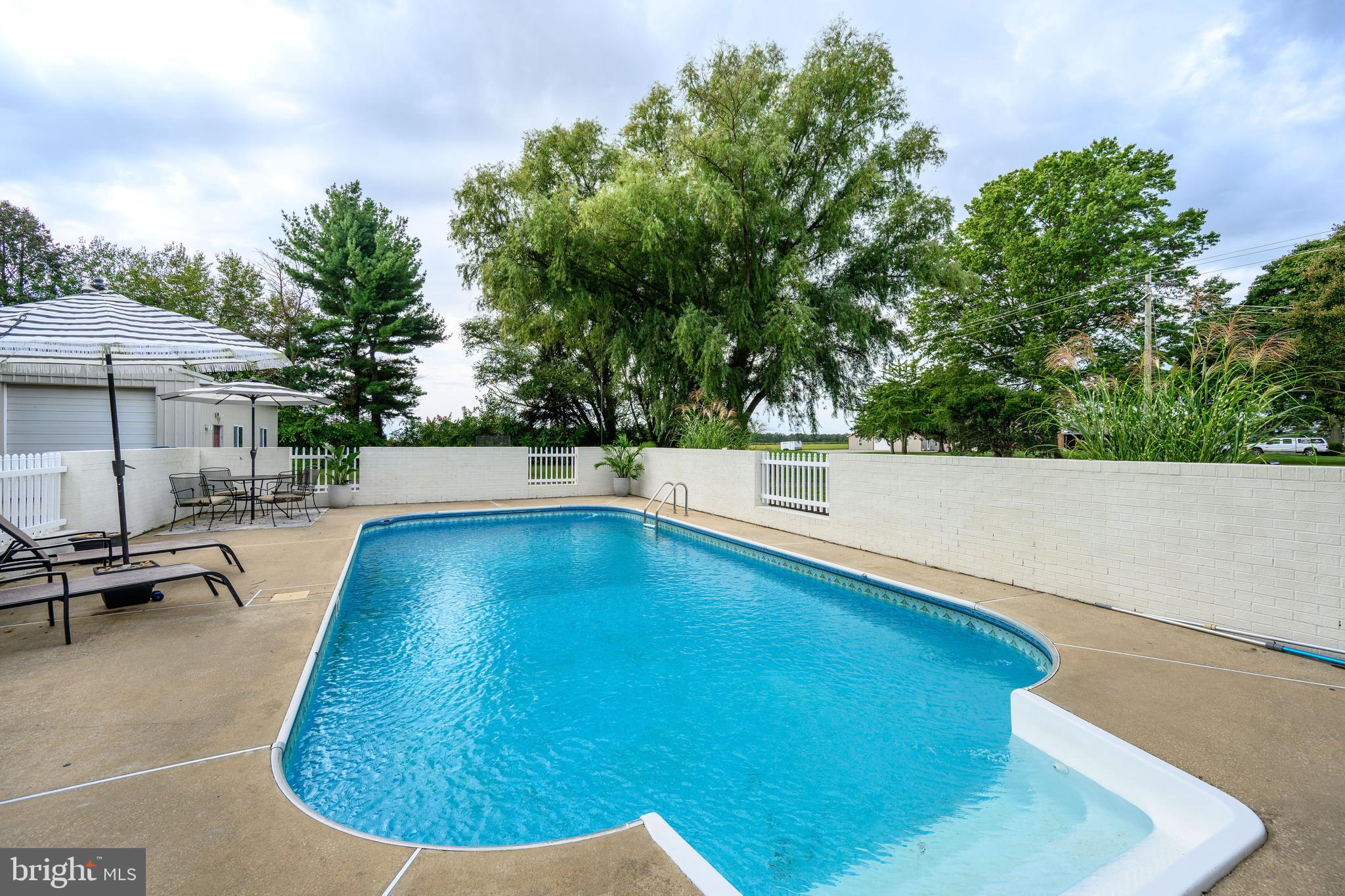 7653 Broad Neck Road Chestertown, MD 21620 - Photo 10 of 39 a view of swimming pool with outdoor seating