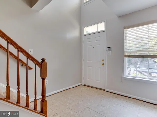 a view of a hallway with windows