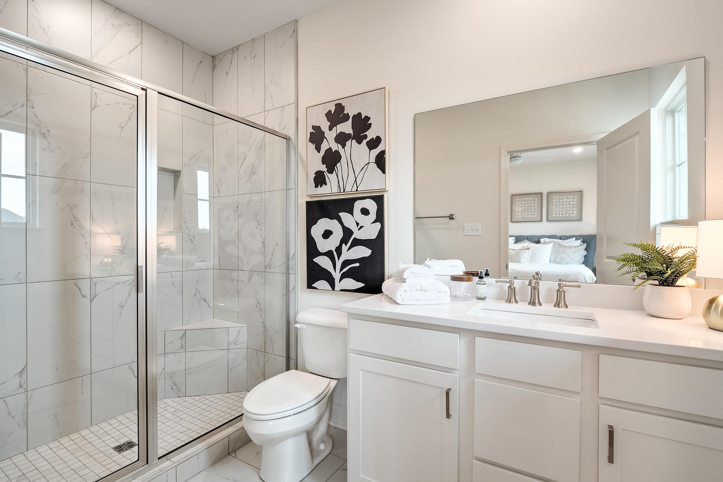 4793 South Houston Levee Road Collierville, TN 38017 - Photo 15 of 20 a bathroom with a sink toilet and shower