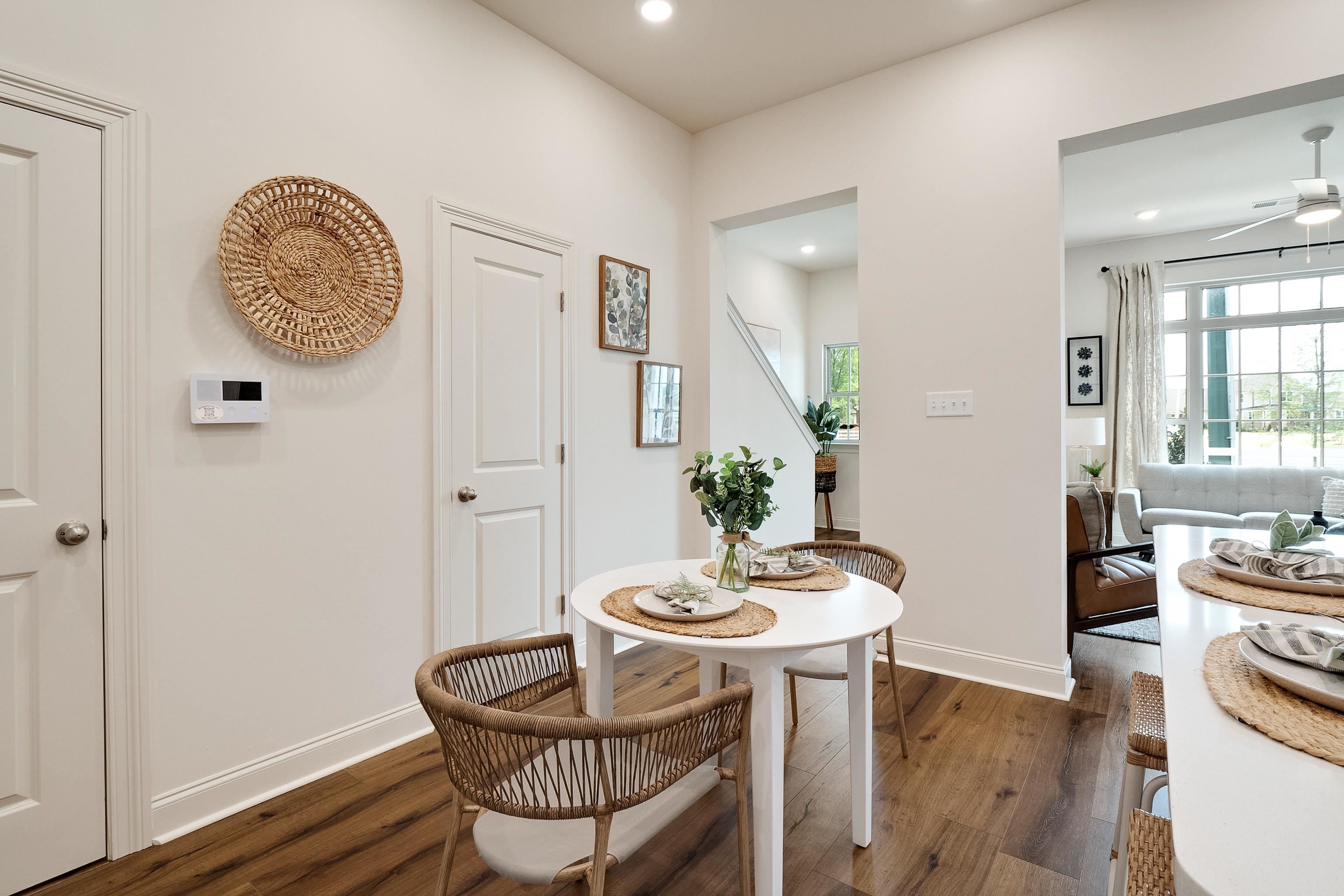 4793 South Houston Levee Road Collierville, TN 38017 - Photo 10 of 20 a view of a dining room with furniture window and wooden floor