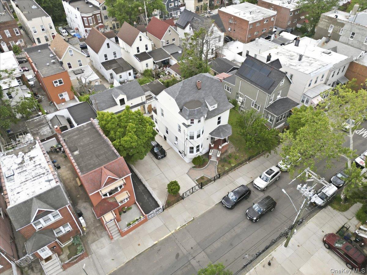 844-48 East 215th Street Bronx, NY 10467 - Photo 8 of 13 an aerial view of a house with garden