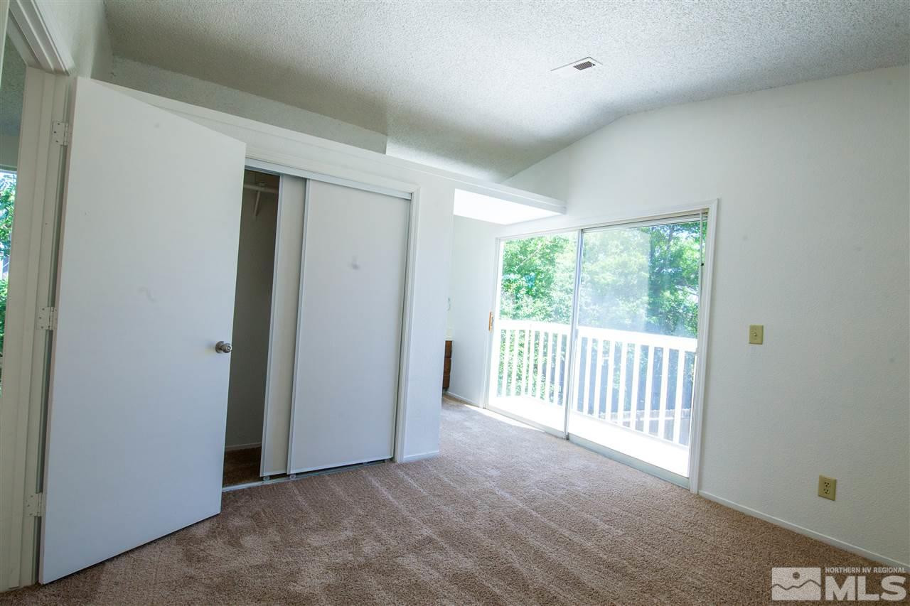 6945 Forsythia Way Reno, NV 89506 - Photo 4 of 17 a view of a livingroom with a porch