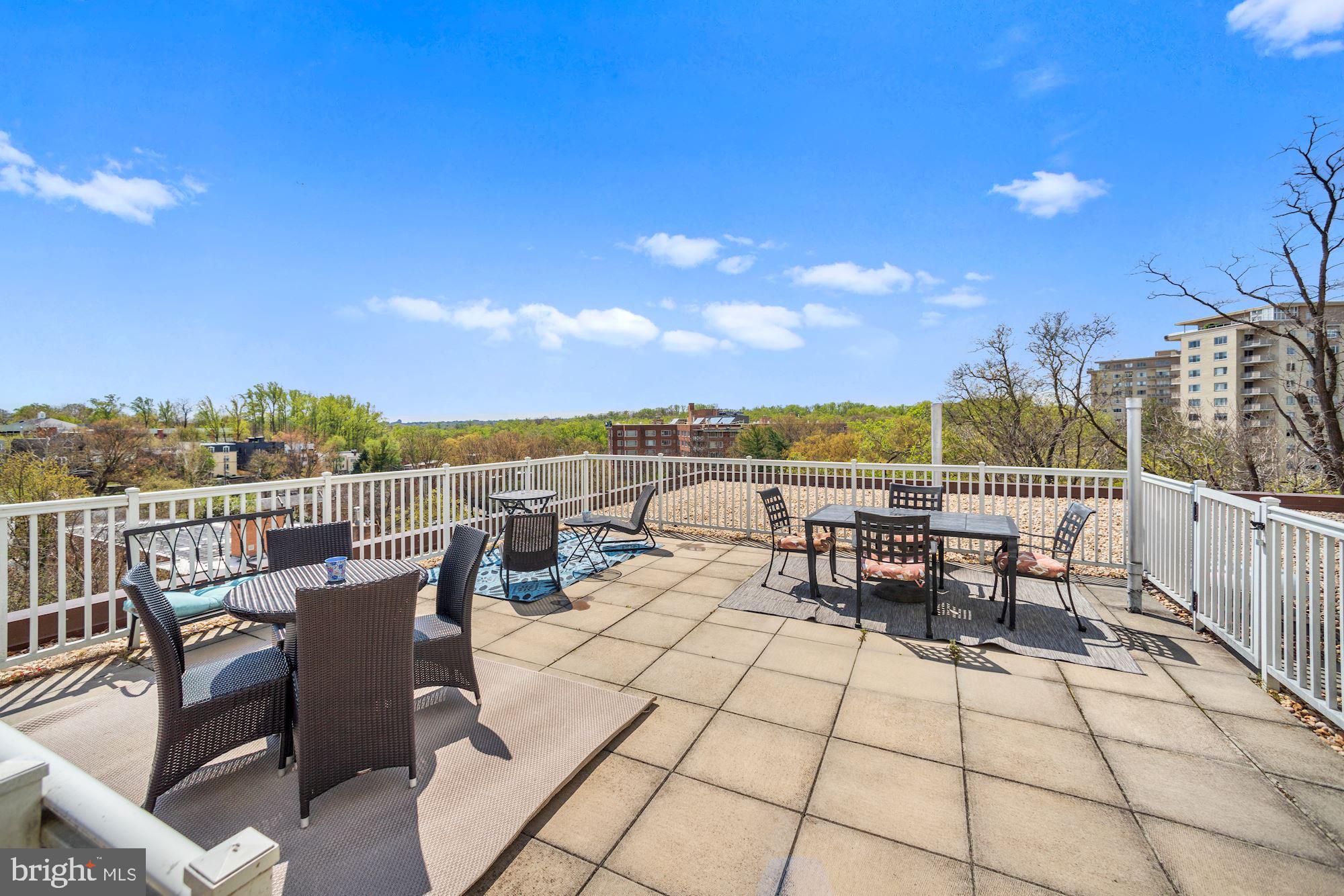 3901 Tunlaw Road Northwest, Unit 506 Washington, DC 20007 - Photo 12 of 21 a view of a terrace with chairs