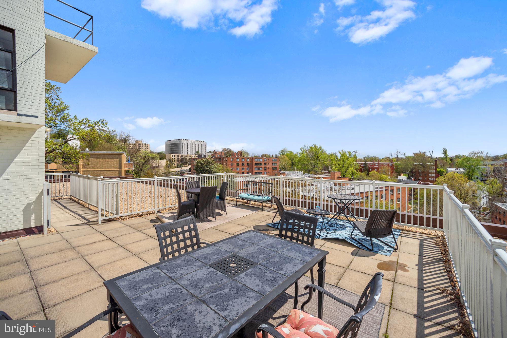 3901 Tunlaw Road Northwest, Unit 506 Washington, DC 20007 - Photo 13 of 21 a view of a terrace with sitting area