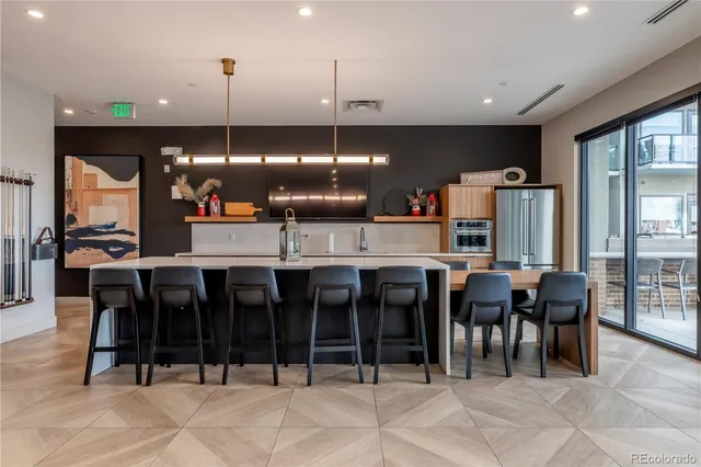 a group of people sitting in living room