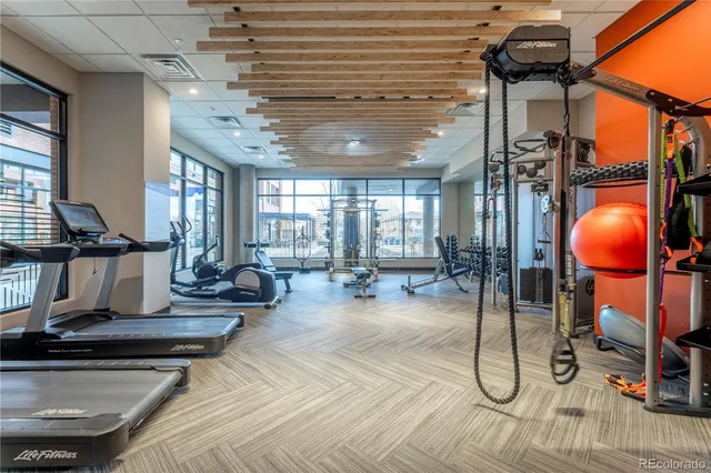 a room with lots of tables and chairs