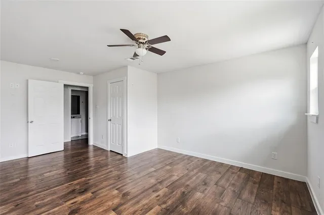 a bathroom with double sink and a mirror