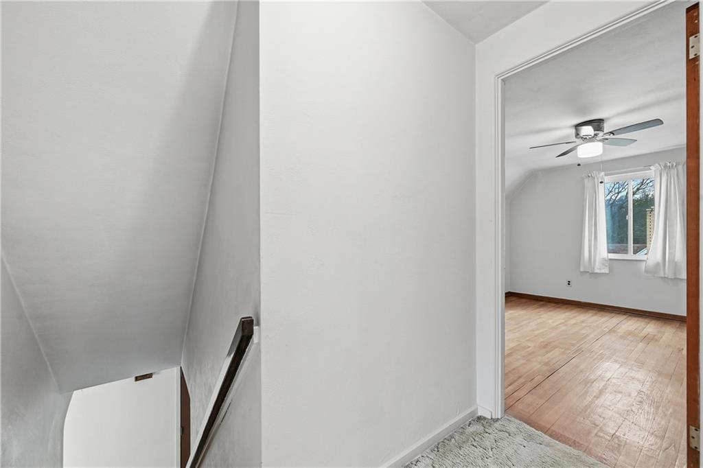 824 Vilsack Road Glenshaw, PA 15116 - Photo 26 of 44 a view of a hallway with wooden floor