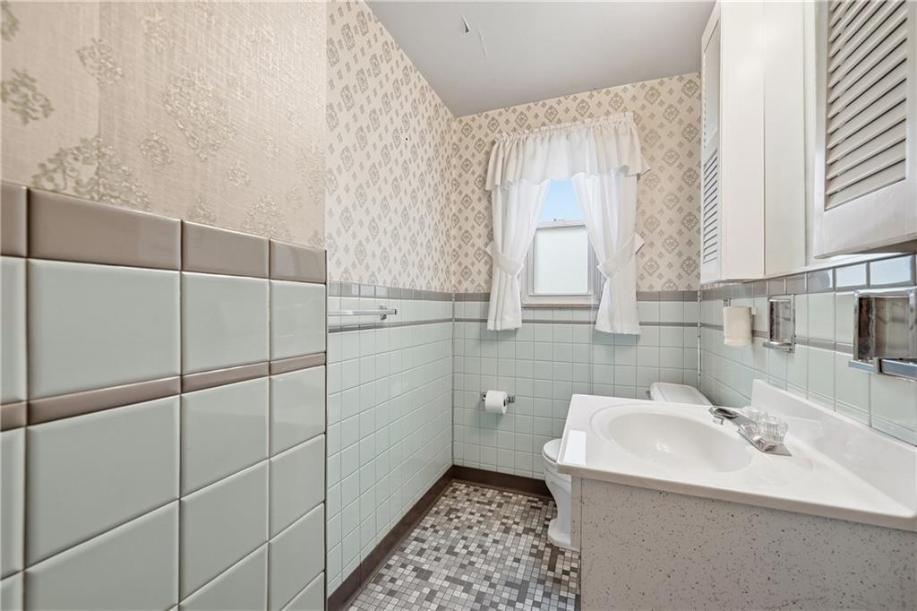 824 Vilsack Road Glenshaw, PA 15116 - Photo 10 of 44 a bathroom with a sink toilet and shower