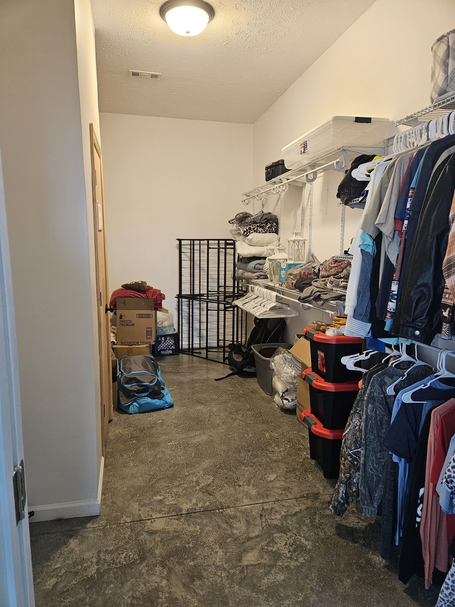 192 Bell Road Morrison, TN 37357 - Photo 3 of 13 a view of walk in closet with clothes and shoes
