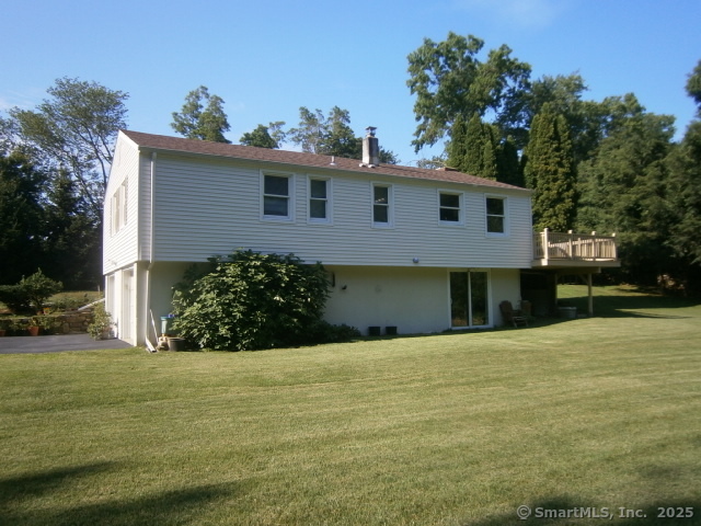 18 Hales Road Westport, CT 06880 - Photo 23 of 26 a front view of a house with a yard