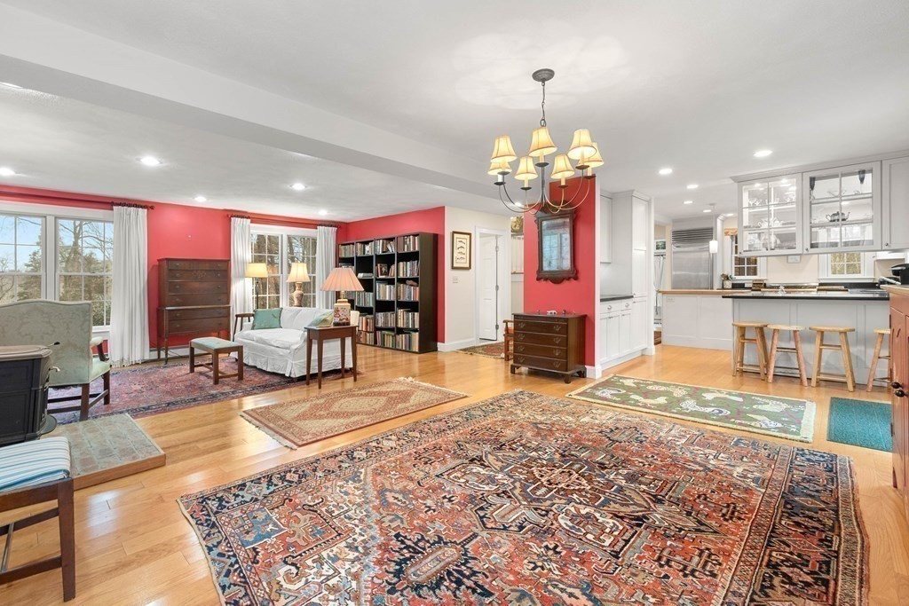 5 Northedge Road Hamilton, MA 01982 - Photo 15 of 42 a living room with fireplace furniture and a chandelier