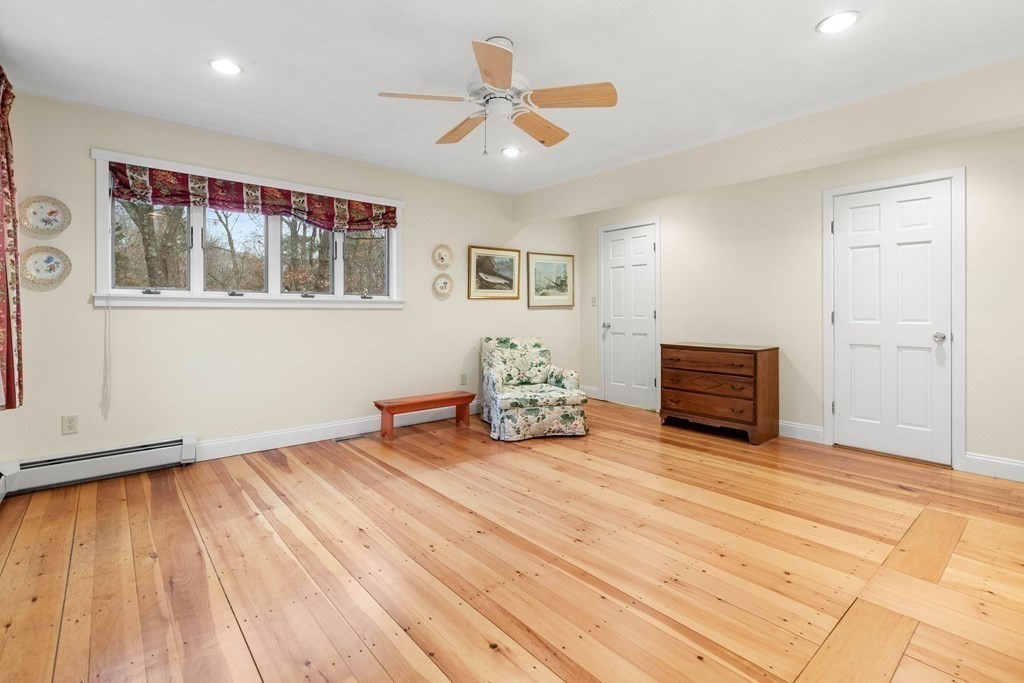 5 Northedge Road Hamilton, MA 01982 - Photo 19 of 42 a room with hard wood floor and a ceiling fan