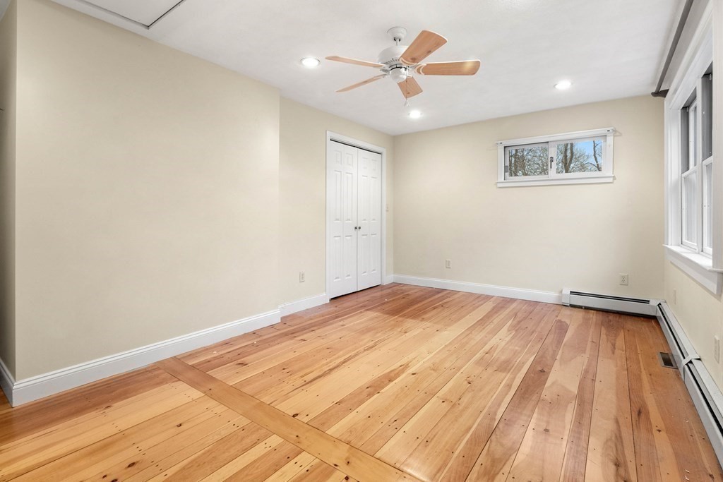 5 Northedge Road Hamilton, MA 01982 - Photo 23 of 42 a view of a room with wooden floor and a ceiling fan