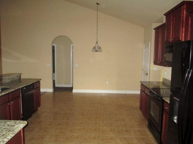 511 Pheasant Trail Crestview, FL 32536 - Photo 23 of 50 a view of a kitchen with a sink