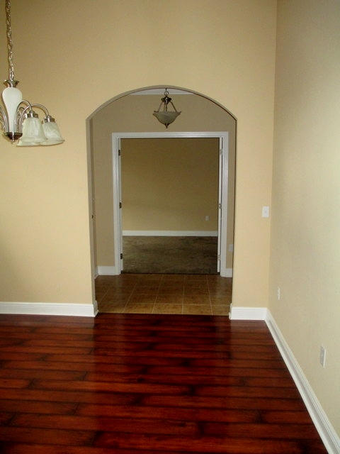 511 Pheasant Trail Crestview, FL 32536 - Photo 9 of 50 a view of room with wooden floor