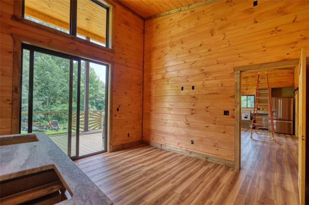 485 Church Street Blue Ridge, GA 30513 - Photo 61 of 85 a room with wooden floor and a balcony view