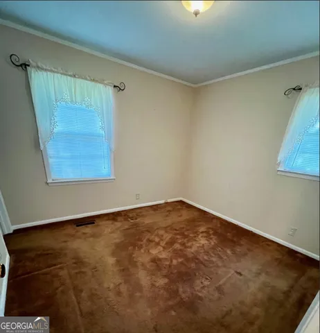 an empty room with a window