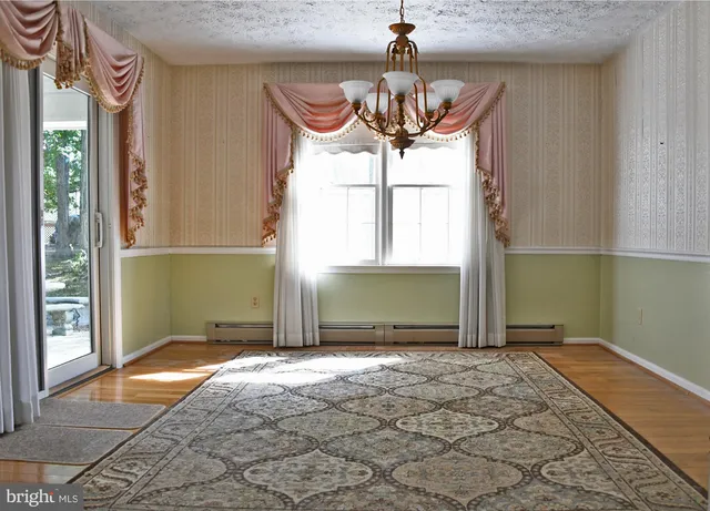 a view of a room with a chandelier