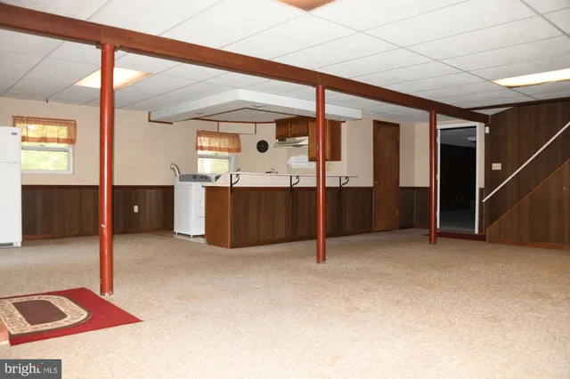 a view of an empty room with window