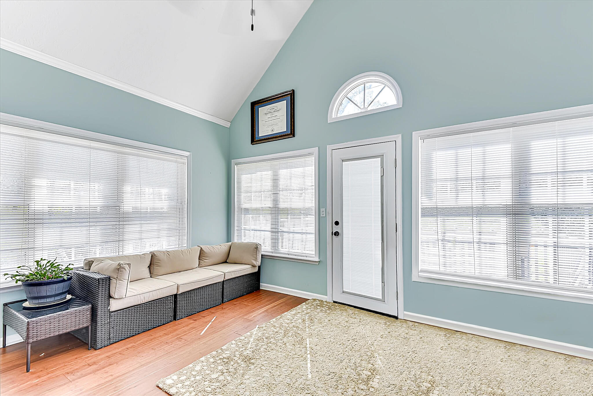 4480 Cape Cod Drive Evans, GA 30809 - Photo 13 of 40 Light-filled sunroom — perfect for relaxing, reading, or enjoying the view year-round