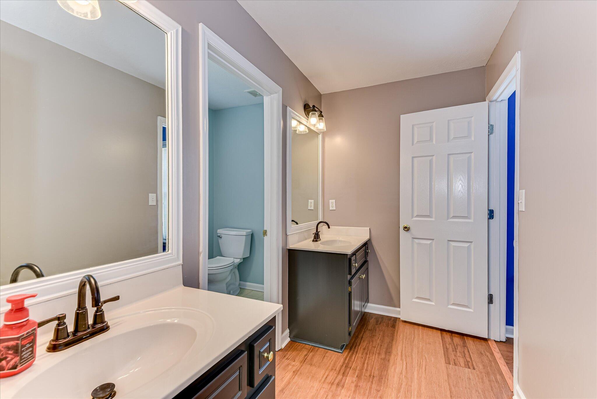 4480 Cape Cod Drive Evans, GA 30809 - Photo 21 of 42 Full Bath in Secondary Bedroom areas, Double Sinks with Separate tub/toilet room. Entrances into 2 secondary bedrooms is the ultimate convenience!