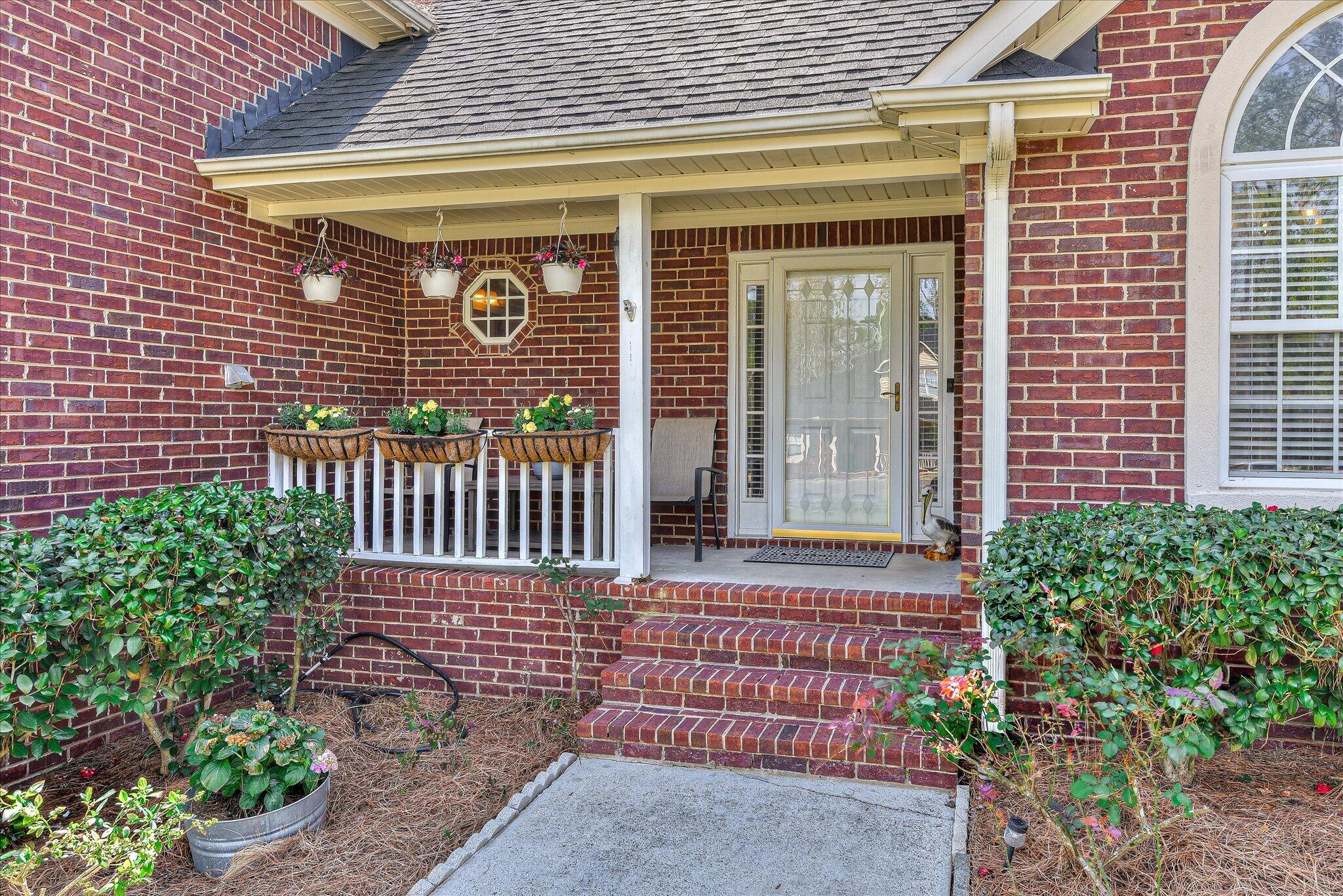 4480 Cape Cod Drive Evans, GA 30809 - Photo 3 of 42 Just big enough to enjoy the warm summer evenings on the front porch