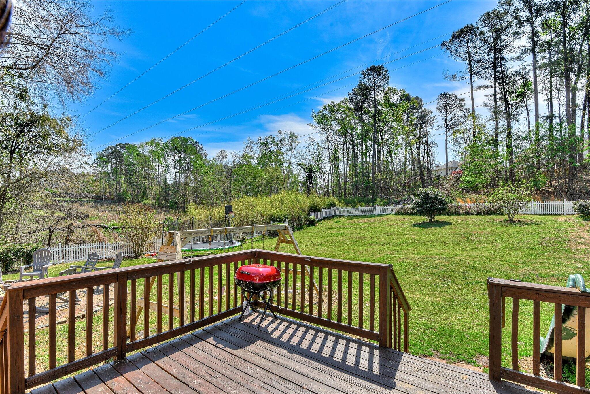 4480 Cape Cod Drive Evans, GA 30809 - Photo 4 of 40 Elevated deck overlooking the backyard — ideal for grilling or unwinding