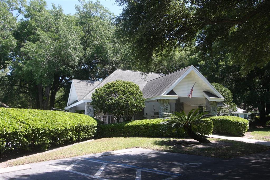 810 Loch Calder, Unit 25 Apopka, FL 32712 - Photo 21 of 24 a front view of house with yard and green space