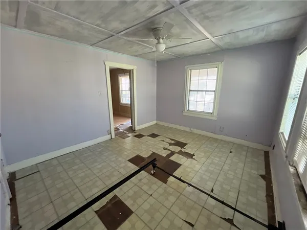 a view of an empty room and window