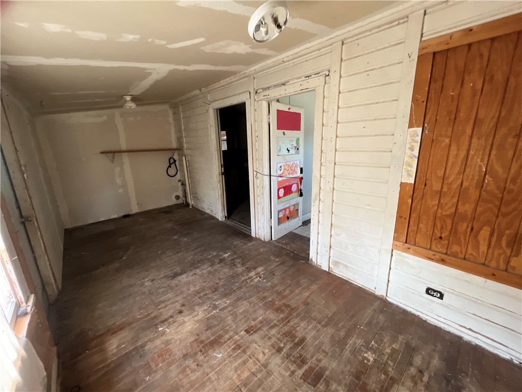 503 Johnson Street Freer, TX 78357 - Photo 19 of 24 a view of a hallway with storage and utility room