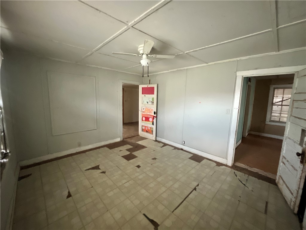 503 Johnson Street Freer, TX 78357 - Photo 20 of 24 an empty room with an empty space and windows