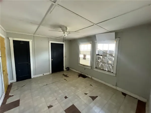 an empty room with windows