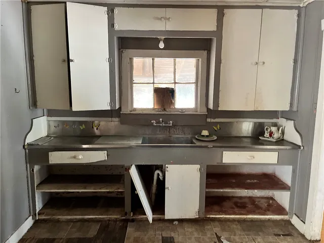 a view of front door with outdoor seating