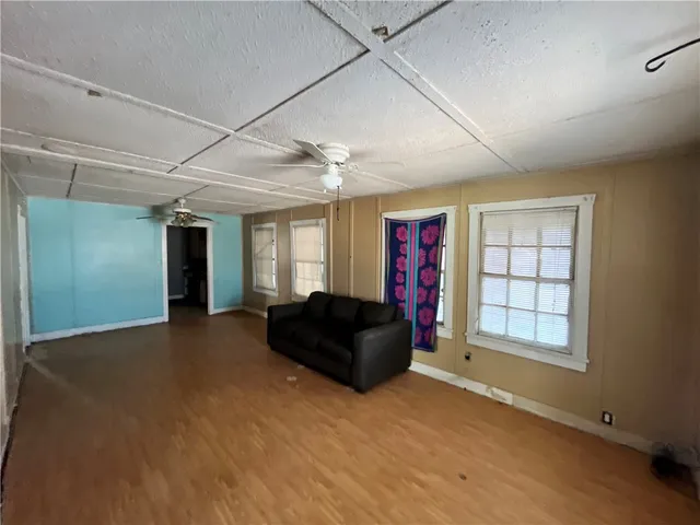 a view of an empty room and window