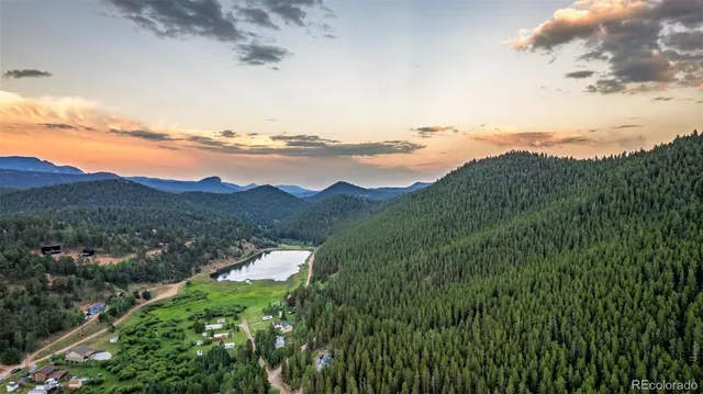 a view of lake with mountain