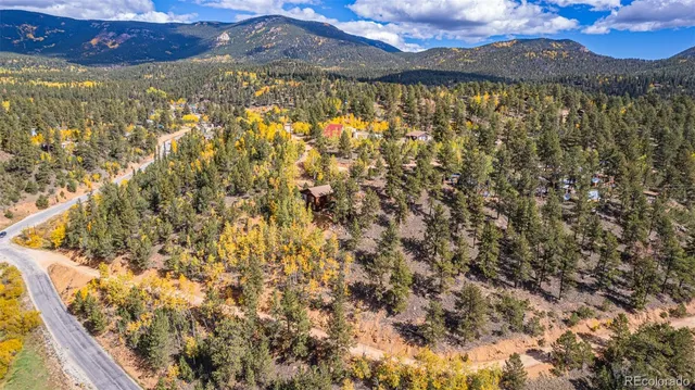 a view of mountain with lake