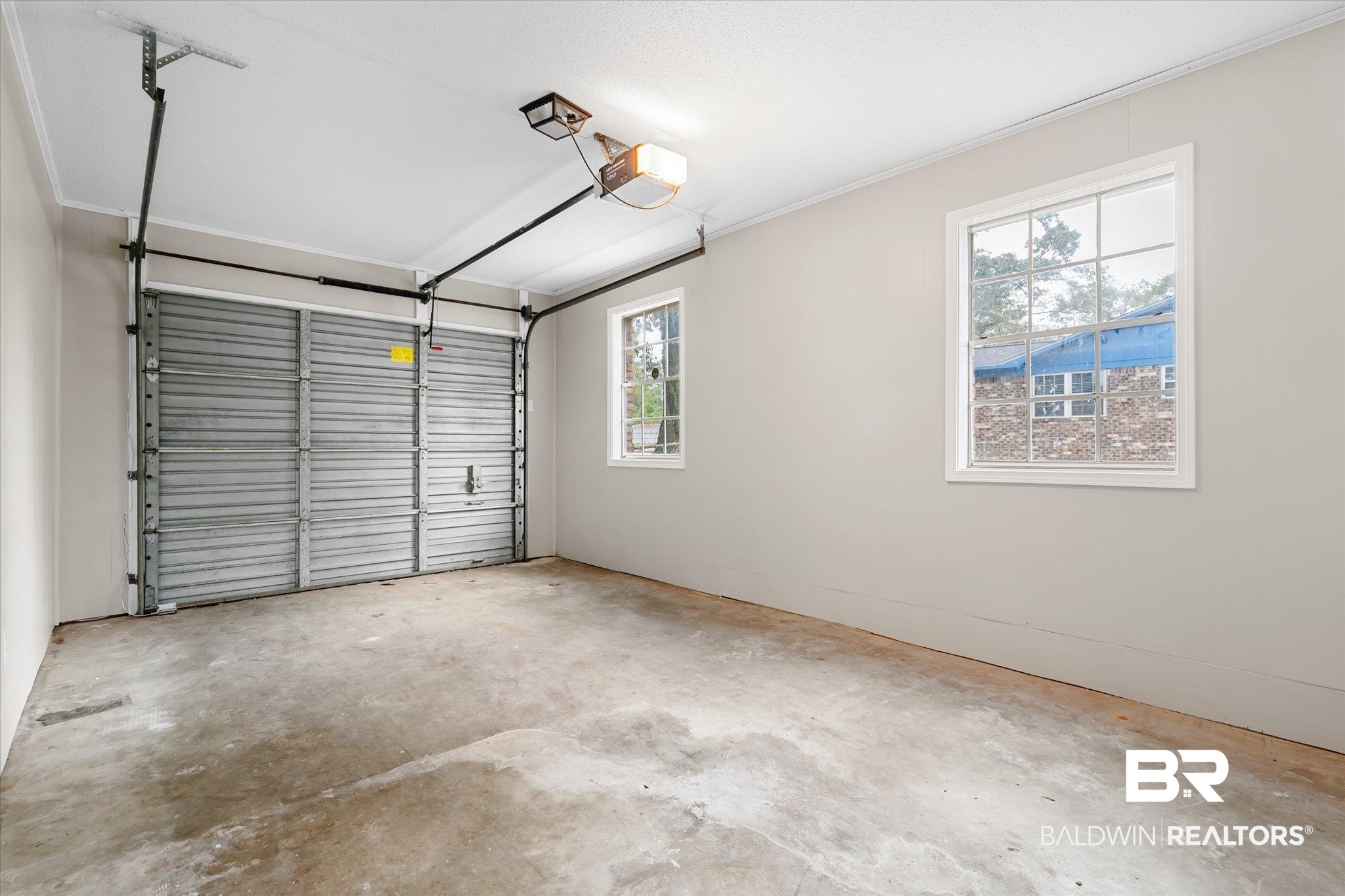 5015 Golfway Drive Eight Mile, AL 36613 - Photo 24 of 31 Garage featuring a garage door opener