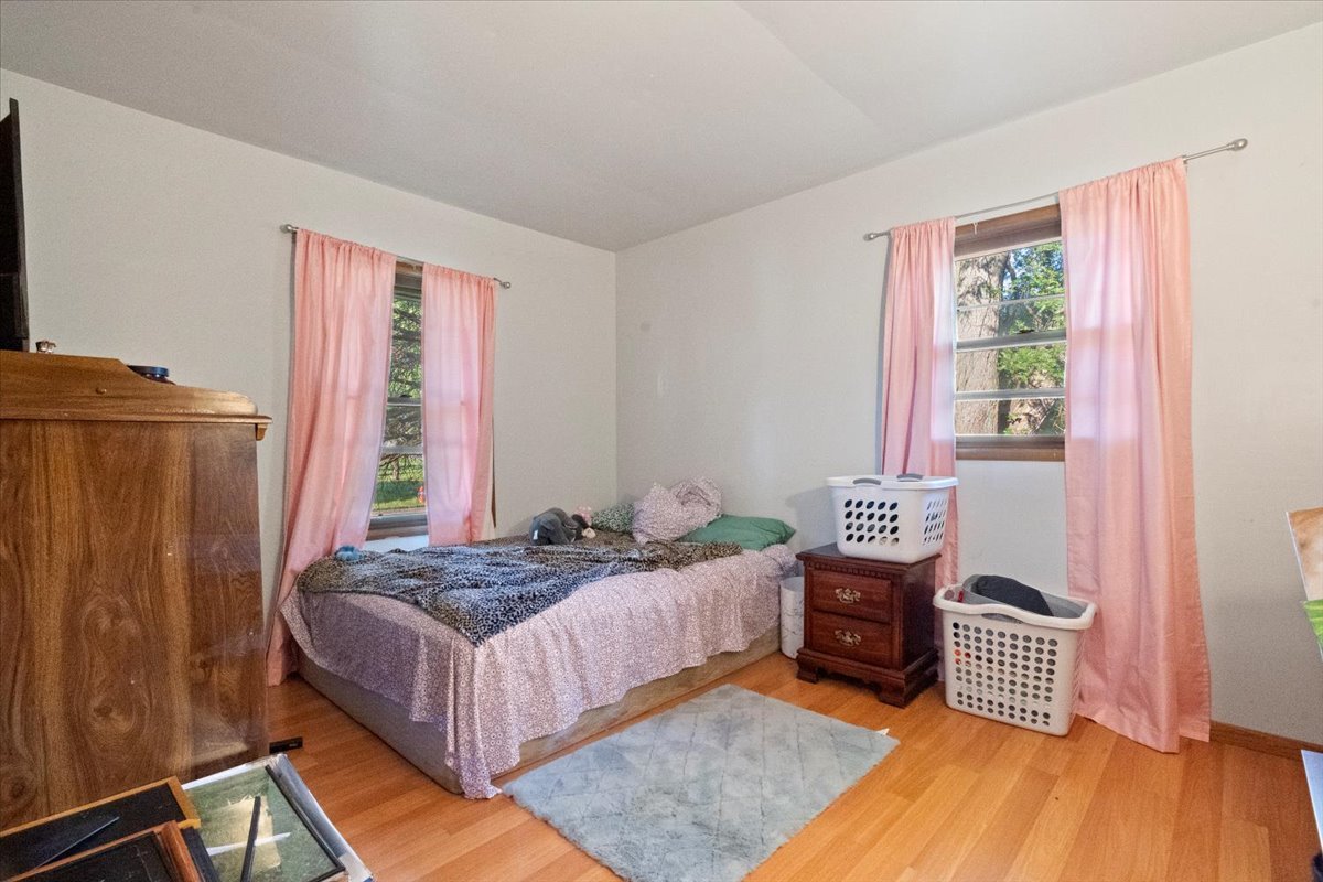 3507 Atlantic Avenue Gurnee, IL 60031 - Photo 17 of 33 a bedroom with a bed and a window