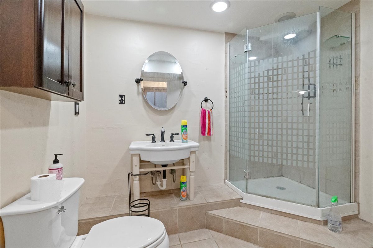 3507 Atlantic Avenue Gurnee, IL 60031 - Photo 19 of 33 a bathroom with a sink a toilet and shower