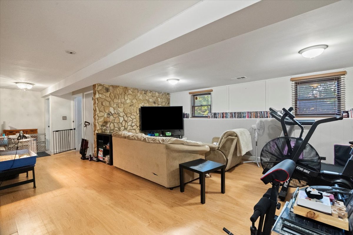 3507 Atlantic Avenue Gurnee, IL 60031 - Photo 23 of 33 a living room with furniture and a flat screen tv