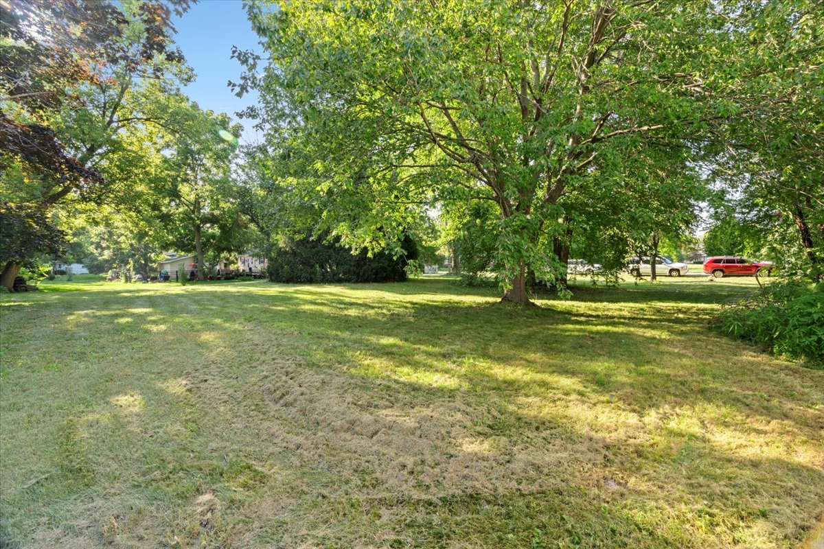 3507 Atlantic Avenue Gurnee, IL 60031 - Photo 31 of 33 a view of a grassy field with trees