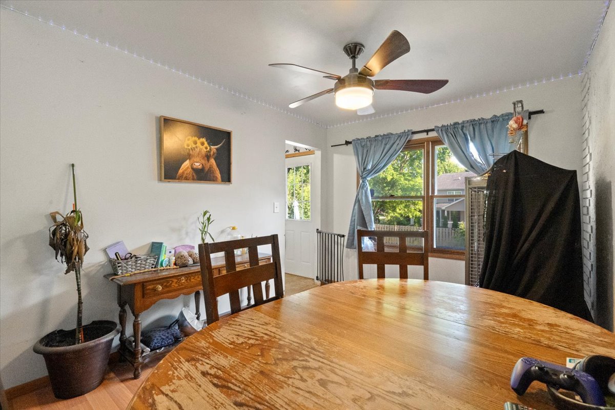 3507 Atlantic Avenue Gurnee, IL 60031 - Photo 9 of 33 a bedroom with a bed and a chandelier