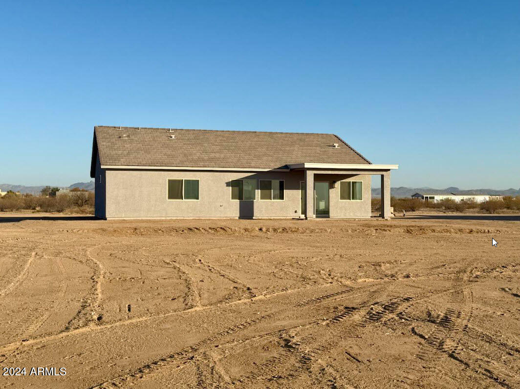 21345 West Sleepy Ranch Road Wittmann, AZ 85361 - Photo 12 of 19 Back of property _1_acre_flat_lot