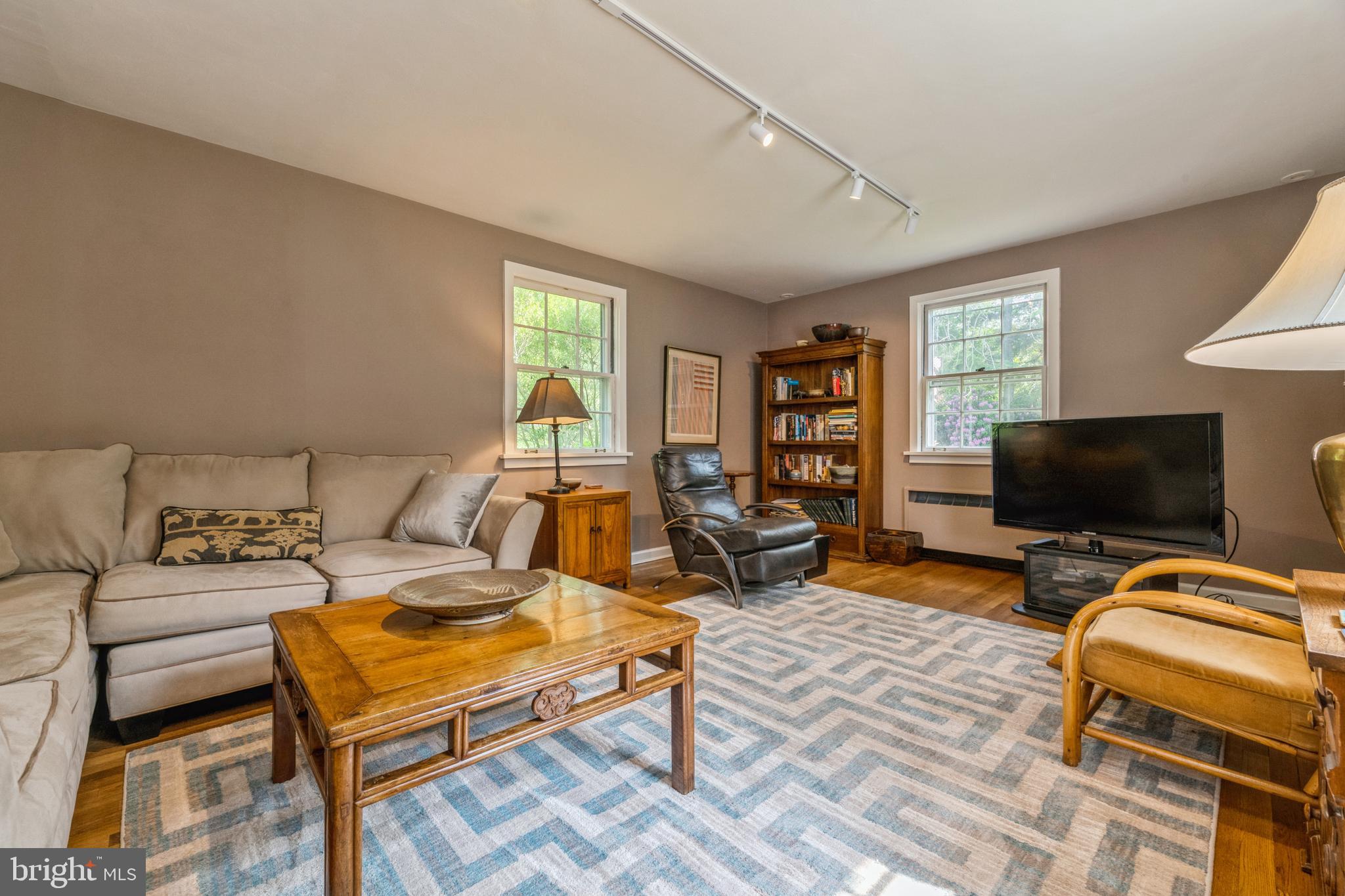7 Perry Drive Ewing, NJ 08628 - Photo 21 of 39 a bedroom with furniture and a flat screen tv