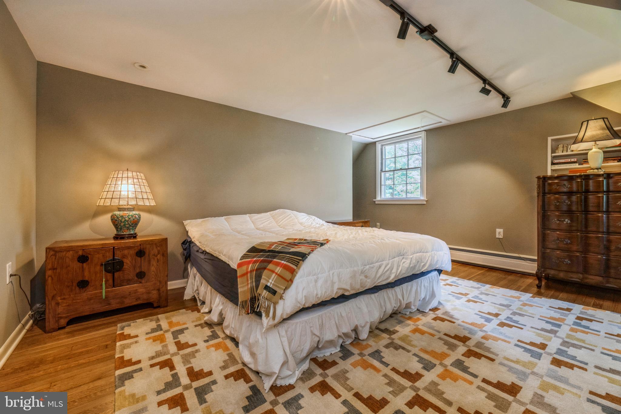 7 Perry Drive Ewing, NJ 08628 - Photo 25 of 39 a bedroom with a bed and a cabinets