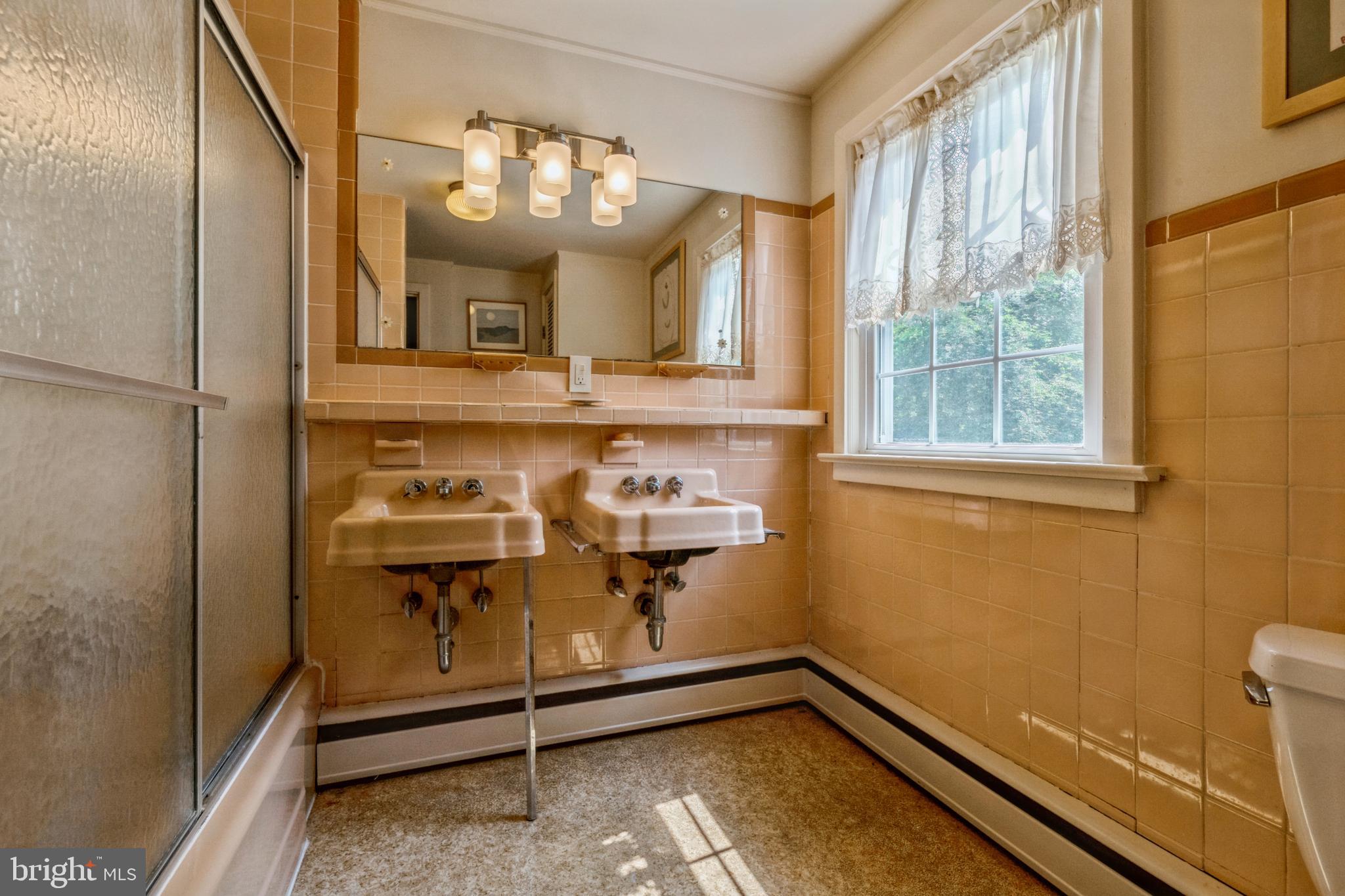 7 Perry Drive Ewing, NJ 08628 - Photo 28 of 39 a view of a room with rack on the wall and a window