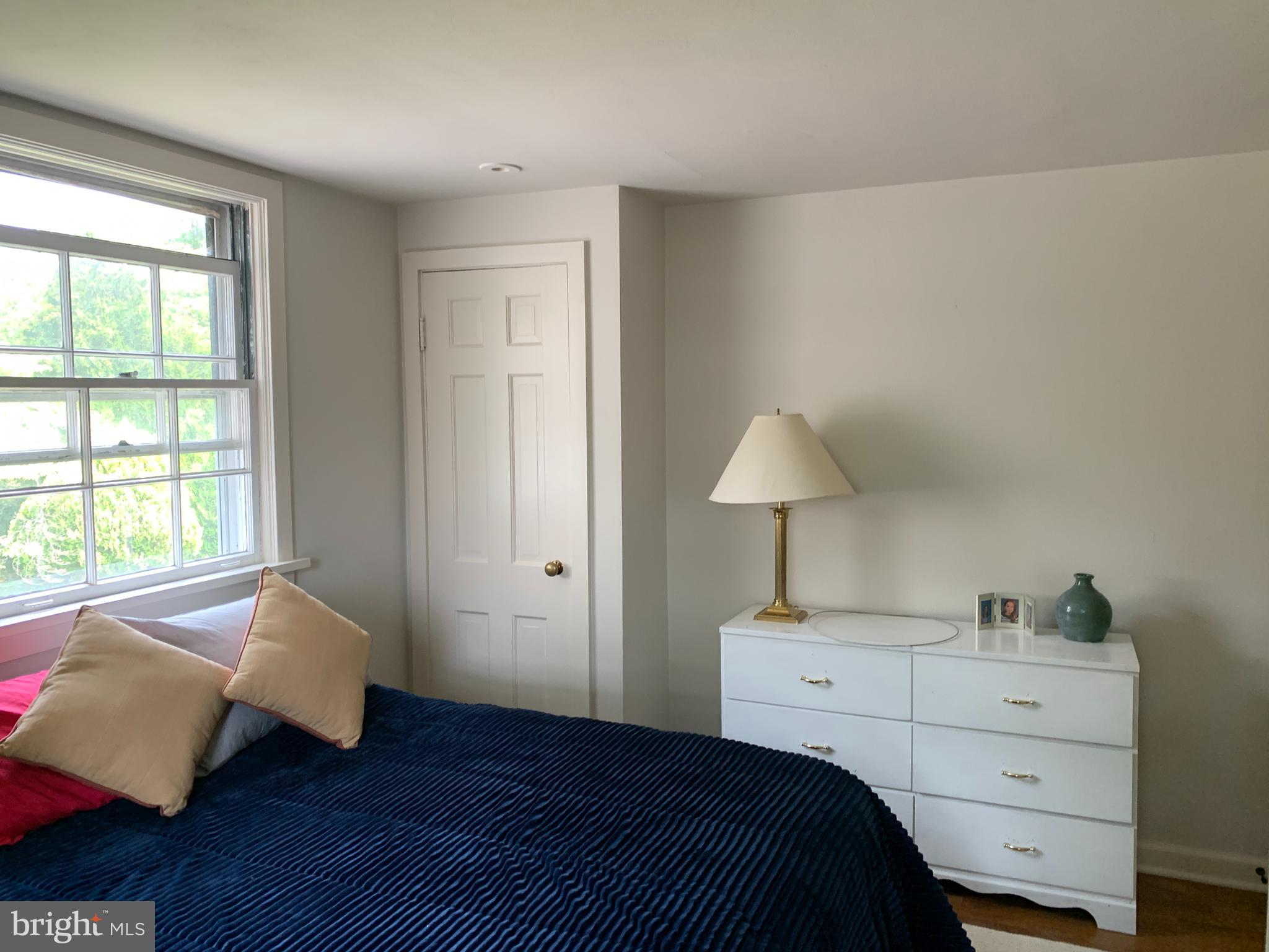 7 Perry Drive Ewing, NJ 08628 - Photo 29 of 39 a bedroom with a bed and a window
