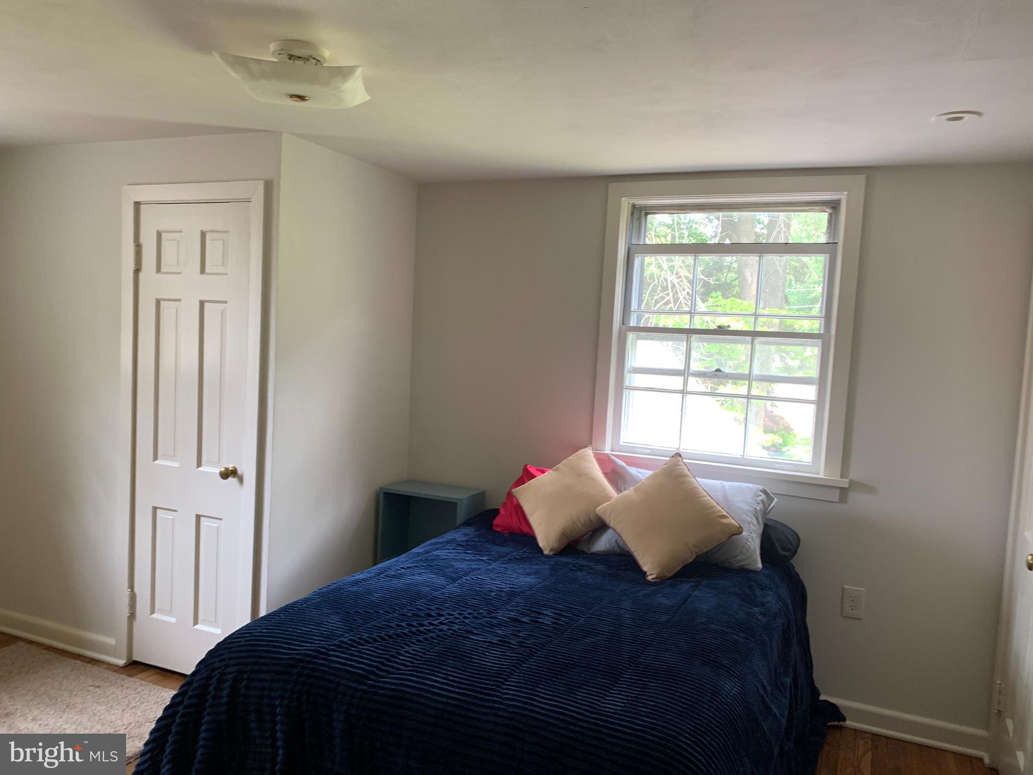 7 Perry Drive Ewing, NJ 08628 - Photo 30 of 39 a bedroom with a bed and a window